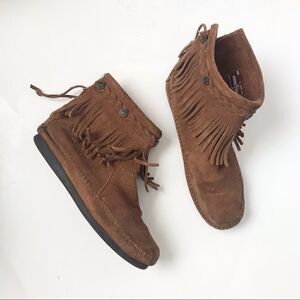 Minnetonka brown leather fringe moccasins with metal detailing